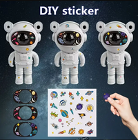 Proiector LED in forma de astronaut cu sunete si lumini, stickere autoadezive, conexiune Bluetooth