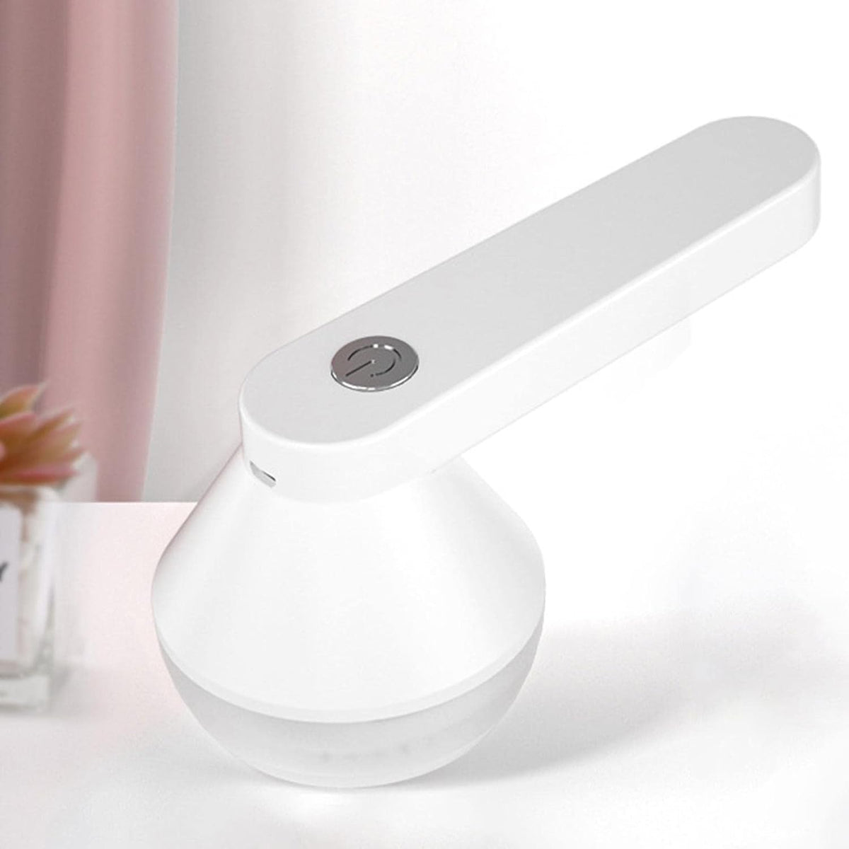 Aparat electric pentru curatat scame