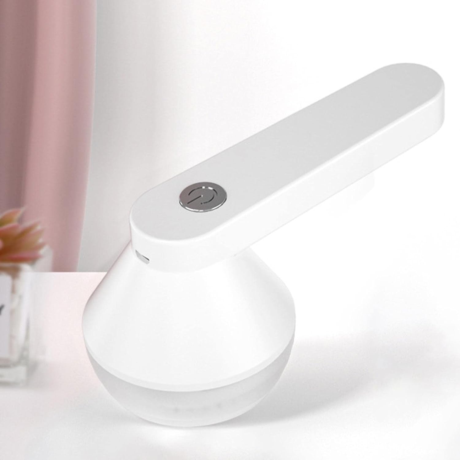 Aparat electric pentru curatat scame