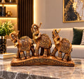 Statuetă Decorativă Premium cu 3 Elefanți, Design Oriental, Finisaj Bronz-Auriu, din Rășină – 27 × 13 cm