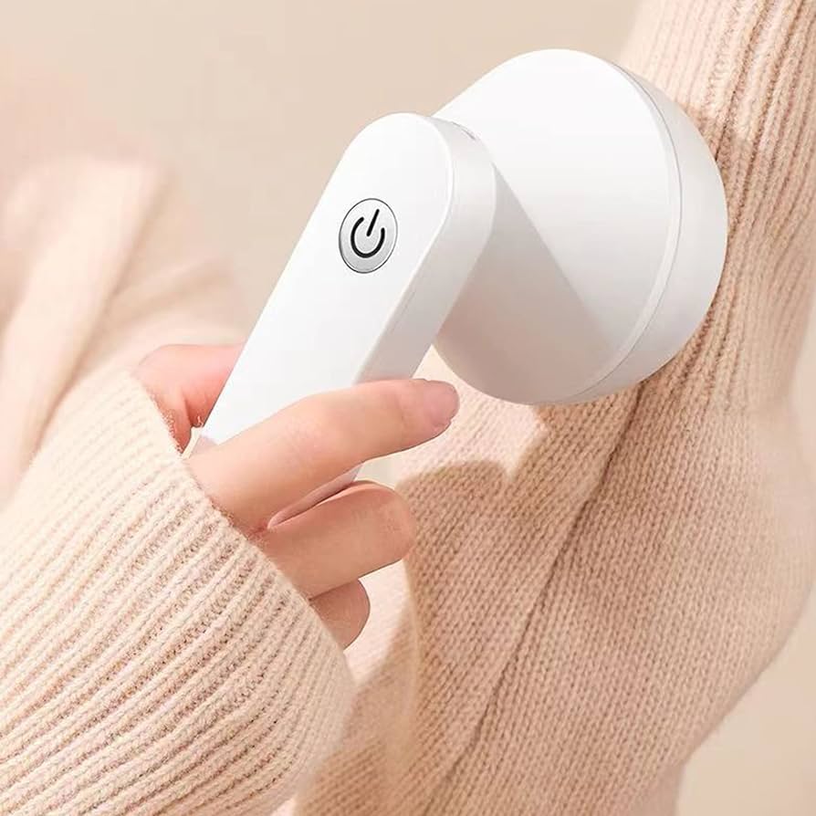 Aparat electric pentru curatat scame