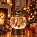 Felinar Decorativ Premium de Crăciun cu Moș Crăciun, Muzică, Lumină Caldă LED și Efect de Ninsoare – 20 × 11 cm