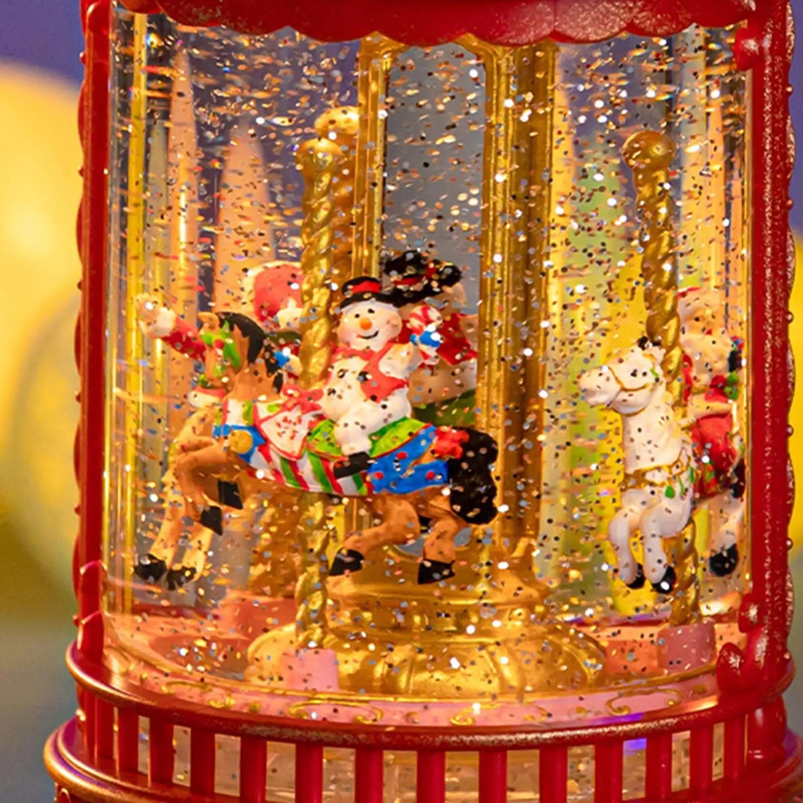 Glob de zapada muzical cu carusel de Craciun, premium,cu lumini LED, efect de ninsoare si figurine Mos Craciun si Om de Zapada