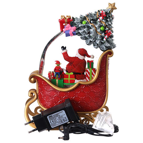 Lampa decorativa Craciun cu Mos Craciun in sanie, lumina si 8 melodii festive