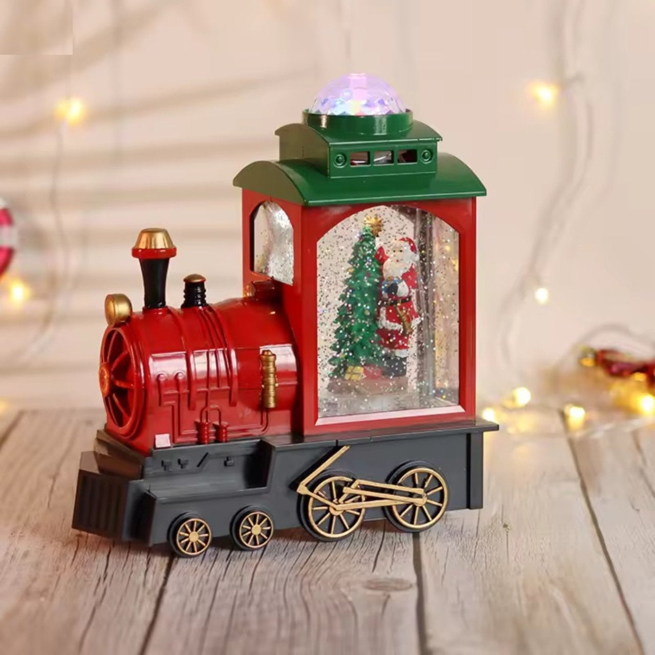 Tren locomotiva decorativa de Craciun cu Mos Craciun, bradut, efect ninsoare, lumini LED si functie muzicala