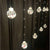 Instalatie tip globuri cu LED si figurine, 10 globuri, 3 m
